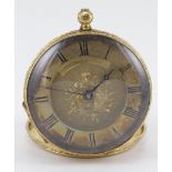 Ladies 18ct gold ladies fob / pocket watch. The circular floral / gilt dial with black roman