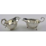 Two silver sauce boats, hallmarked for Birmingham, 1921 and 1931. Weighs 5 ¾ oz approx.