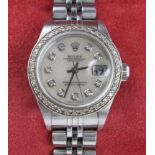 Ladies Rolex Date Just Oyster Perpetual wristwatch in a stainless steel case on a