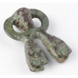 Viking British Strap End with Bear Heads, ca. 800 AD, open work design with numeroud bear heads;
