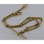 18ct gold hallmarked "T" bar pocket watch chain. Approx length 36.5cm, weight 20.8g