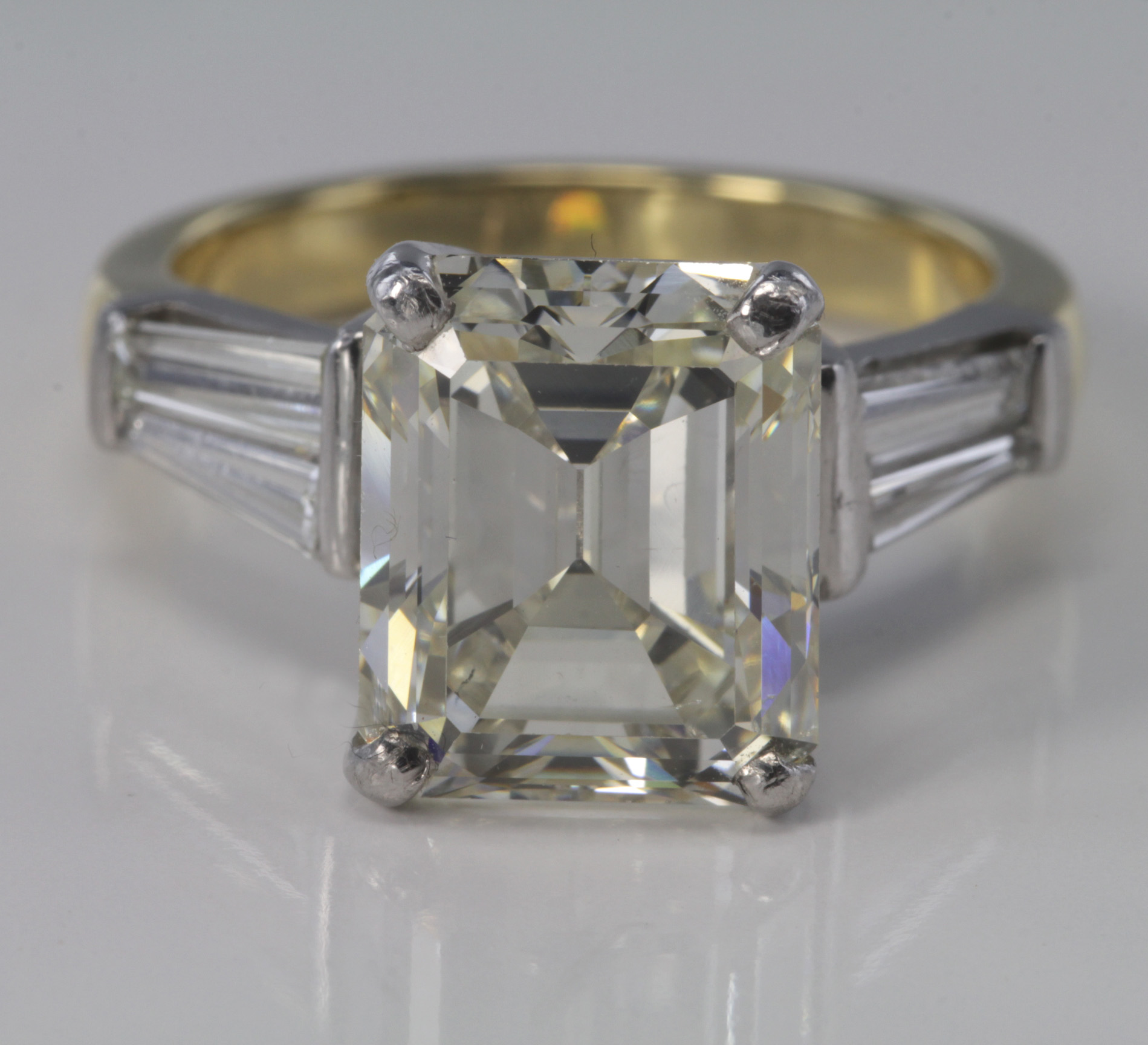 Exquisite 18ct ring set with single emerald cut diamond with a known diamond weight of 5.75ct with - Image 2 of 4