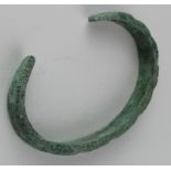 Viking Dragon headed Bracelet, ca. 900 AD, cast solid body with decoration and terminals shaped as