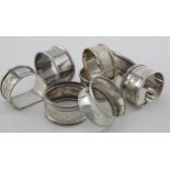 Eight silver napkin rings, various hallmarks includes one pair. Weight 4 oz approx.