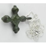 Viking Decorated Cross Pendant, ca. 900 - 1100 AD, cast bronze cruciform pendant with integral loop;