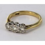 18ct yellow gold ring set with three round brilliant cut diamonds, size L, weight 3.2g.