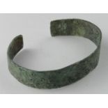 Saxon Bracelet decorated with Sun Symbols, ca. 700 AD, flat-section with engraved sun symbols