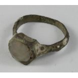 Medieval ring with Glass Gem, ca. 1500 AD, oval shaped band with round bezel; glas/stone gem