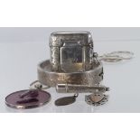 Silver. A collection of silver items, comprising, vesta case, two fobs, bangle, cheroot holder &