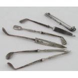 Golfing interest. A novelty five piece sterling silver golf club vanity set, together with a golf