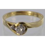 18ct yellow gold diamond solitaire ring in wrapround design with diamond highlight, size P, weight