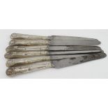 Six Kings pattern silver handled Desert Knives. The handles are all hallmarked "GH, Sheffield,