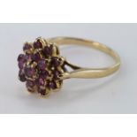 9ct Gold Ring with floral set Amethysts size P weight 4.5g