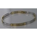 9ct yellow and white gold double bar bracelet, each yellow gold link set with a single channel set