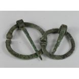 Pair of Romano Celtic Omega broochs, C. 100 A.D. Complete with restored pin intact. Nice green