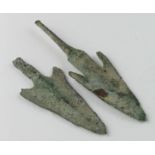 Pair of Bronze Age Arrow Heads, C. 1200 - 800 B.C. Cast bronze rhombic arrowheads with integral
