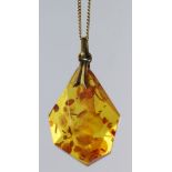 14ct gold chain with amber and gold plated pendant, weight 9.7g. 9ct gold pendant set with cubic