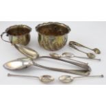 Silver. A collection of silver, including teaspoons, sugar tongs, serving spoons & two bowls, weight