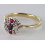 18ct ruby and diamond ring, size L, weight 2.9g.
