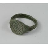 Ancient Roman Christian Ring, ca. 200 AD. Bronze ring with fishing net pattern inscribed on bezel.