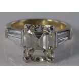 Exquisite 18ct ring set with single emerald cut diamond with a known diamond weight of 5.75ct with