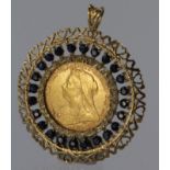 1894 full sovereign in 9ct yellow gold pendant mount set with sapphires, weight 15.2g.