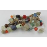 Viking Stone and Glass Necklace, ca. 900 - 1100 AD. Nicely coloured beads; modern string -