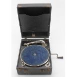 Portable cased gramophone, with winding handle, height 15.5cm, width 28.5cm, depth 35.5cm approx.