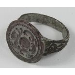 Late Medieval Heraldic Seal Ring, ca. 1500 AD, oval band with inegral bezel depicting a coat of