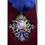 St. Pancras interest. A silver & enamel medal, decorated with a coat of arms & the motto 'Constans