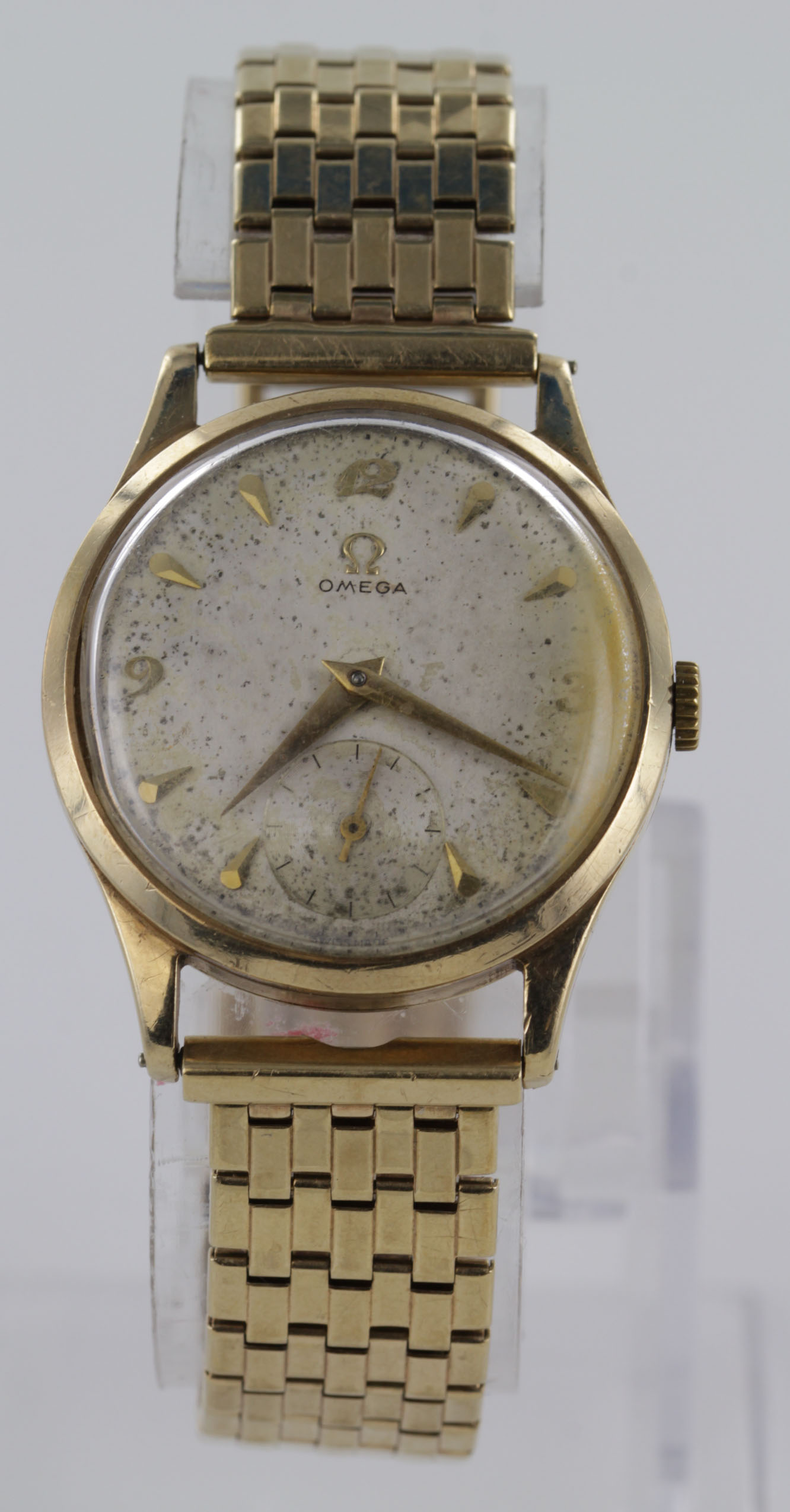 Gents 9ct cased Omega wristwatch circa 1950/52 (serial number 12995080) the cream dial (needs