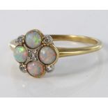 18ct yellow gold opal and diamond ring, size J, weight 2.1g.