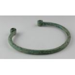 Viking Neck Torc with Coiled Terminals, ca. 900 - 1100 AD. Solid cast body with decorative patterns;
