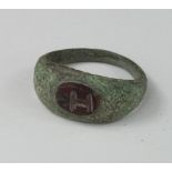 Roman Intaglio Seal Ring, C. 200 A.D. Bronze Ring with Carnelian Intaglio depicting H shaped