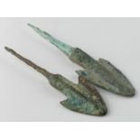 Pair of Bronze Age Arrow Heads, C. 1200 - 800 B.C. Cast bronze flat-barbed arrowheads with