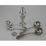 Silver. Three silver ladles (two hallmarked GA, London 1850), sugar sifter, one other spoon & a 1963