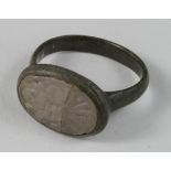 Late Medieval Intaglio Seal Ring , ca. 1500 AD, oval band with inegral bezel; inserted stone