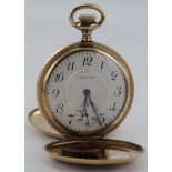 Gold filled full hunter pocket watch by A. W. W. Co. Waltham, silvered dial with arabic numerals,