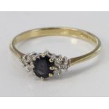 9ct yellow gold sapphire and diamond ring, size O, weight 1.6g.