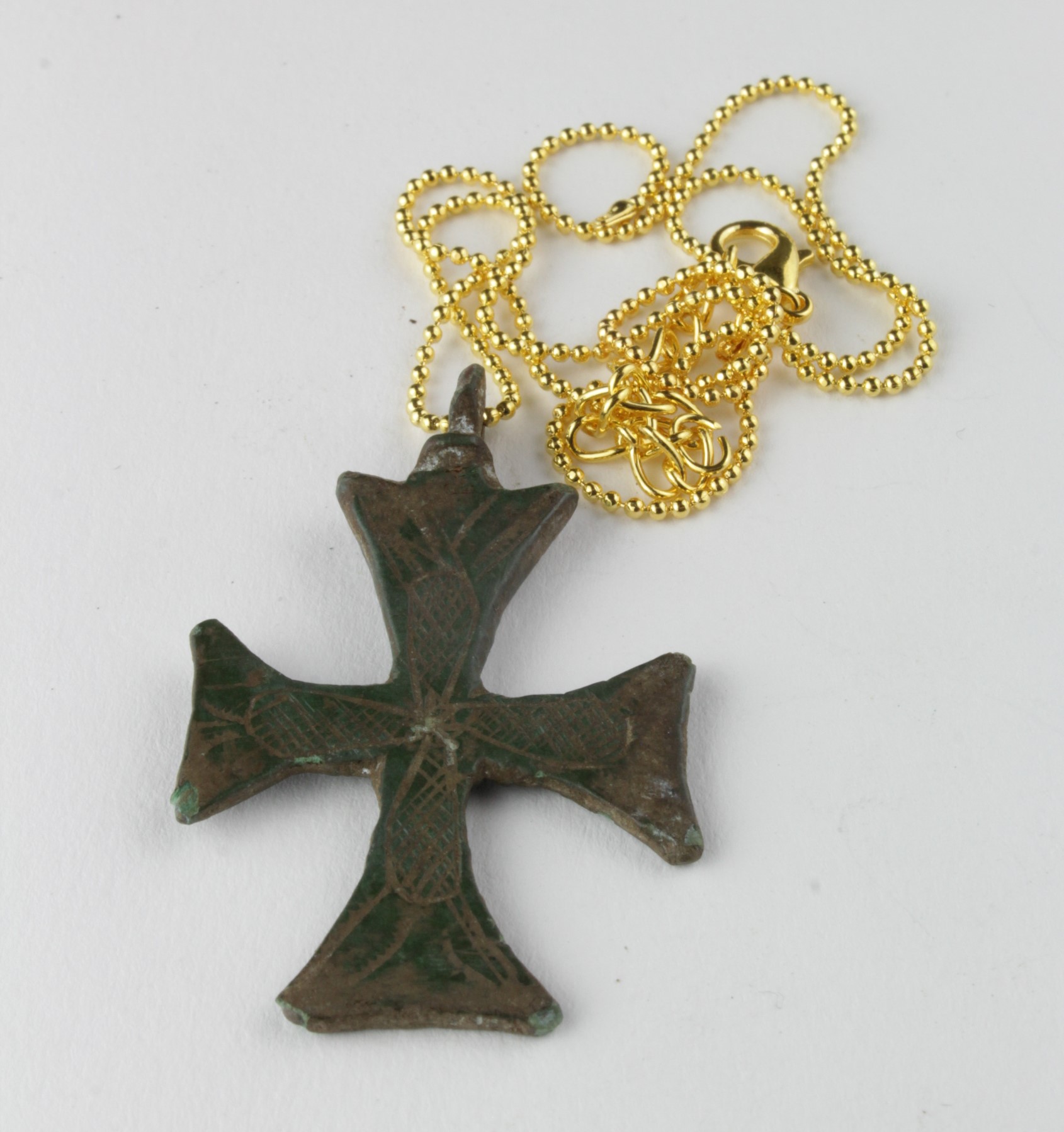 Saxon Decorated Cross Pendant, ca. 700 AD, flat section cross with decoration; integral loop. Very