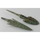 Pair of Bronze Age Arrow Heads, C. 1200 - 800 B.C. Cast bronze flat-barbed and rhombic arrowheads.