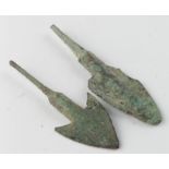 Pair of Bronze Age Arrow Heads, C. 1200 - 800 B.C. Cast bronze flat-barbed and rhombic arrowheads.