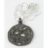 Viking Silver Dragon Fafnir Amulet , ca. 900 AD, Rare, open-work cast pendant depicting the Dragon