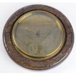 Oak Cased barometer 'The Rhodesian' made by Rivron, Salisbury, total diameter 25cm approx.