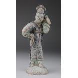 Ming Dancing Lady, C. 1368 - 1644 A.D. Ming Dancing Lady holding an item on her left shoulder.