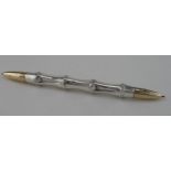 Large bamboo Gucci ballpoint pen, a couple of dinks, length 26cm approx.