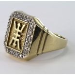 9ct Gold Chinese Symbol Ring surrounded by Diamonds size L weight 6.2g