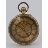 18ct gold fob / pocket watch. The circular floral / gilt dial with black roman numerals, approx