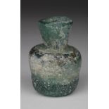 Byzantine / Islamic Glass Miniature Vessel, C. 8th - 10th Century A.D. Intact with restoration. 60