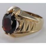 Yellow metal (tests 9ct) Gents Garnet set Ring size T weight 9.1g